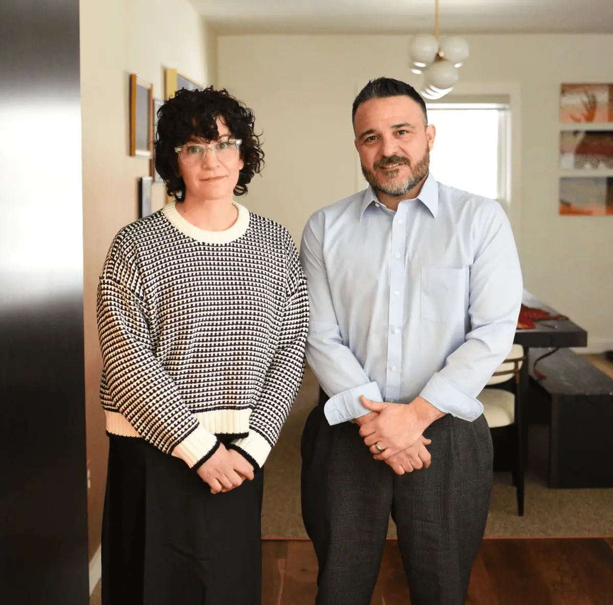 Breonna Frisk and Nicholas A. Frisk in their office